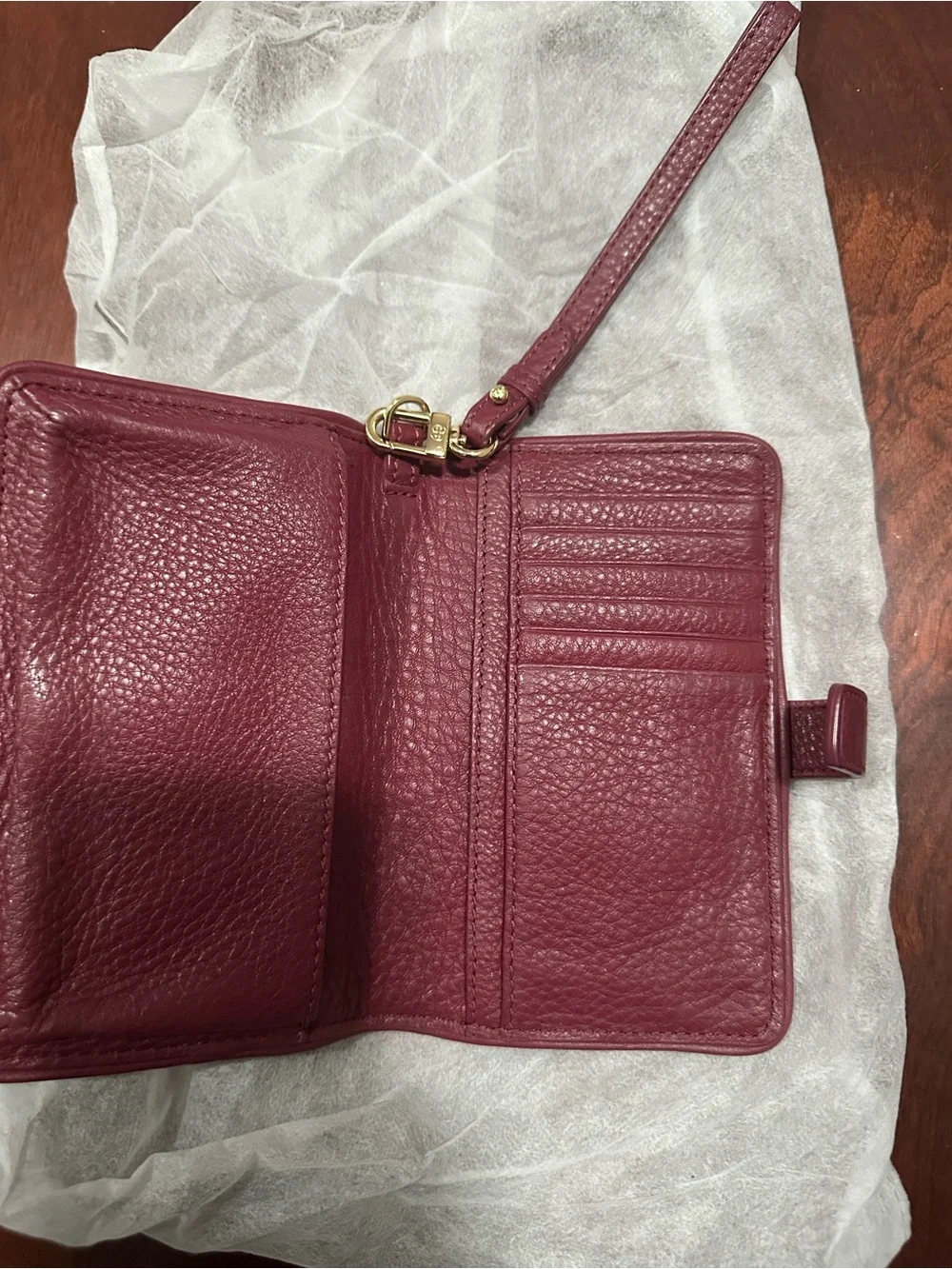 Tory Burch Pebbled Leather Wristlet in Deep Burgundy with Gold Logo